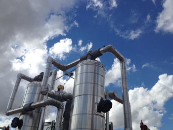 Vapor recovery unit used during processing of oil and gas. 